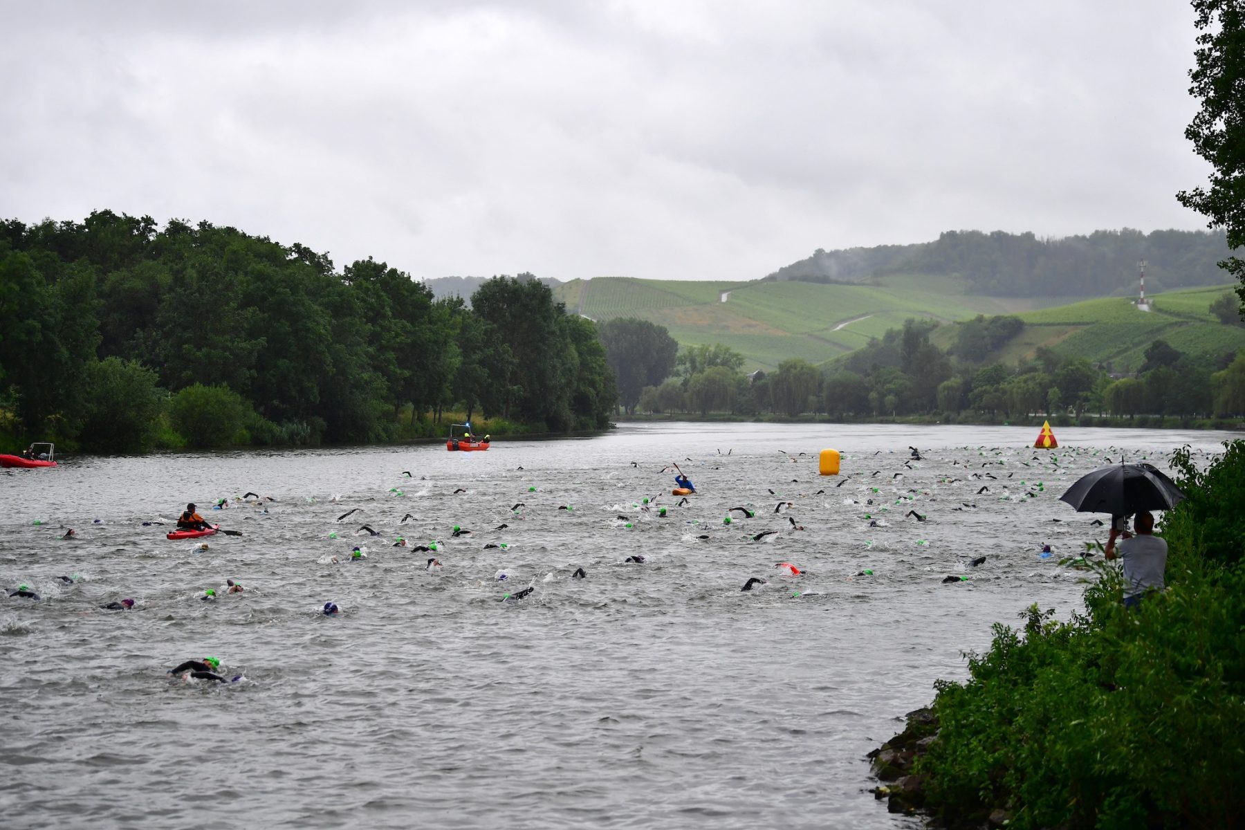 LUXEMBOURG, LUXEMBOURG - JUNE 30: Athletes are seen during the swim leg at the IRONMAN 70.3 Luxembourg on June 30, 2024 in Luxembourg, Luxembourg. (Photo by Alexander Koerner/Getty Images for Ironman)